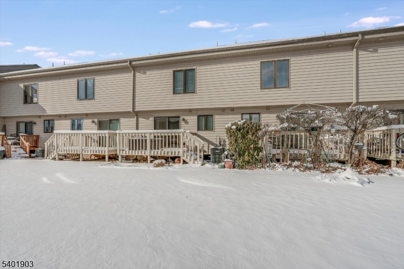 223 Cherokee Road Lafayette, NJ 07848 - Photo 31 of 36 a city view with tall buildings and cars parked in front of it