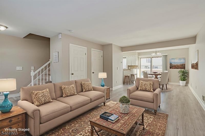 223 Cherokee Road Lafayette, NJ 07848 - Photo 7 of 36 a living room with furniture and wooden floor
