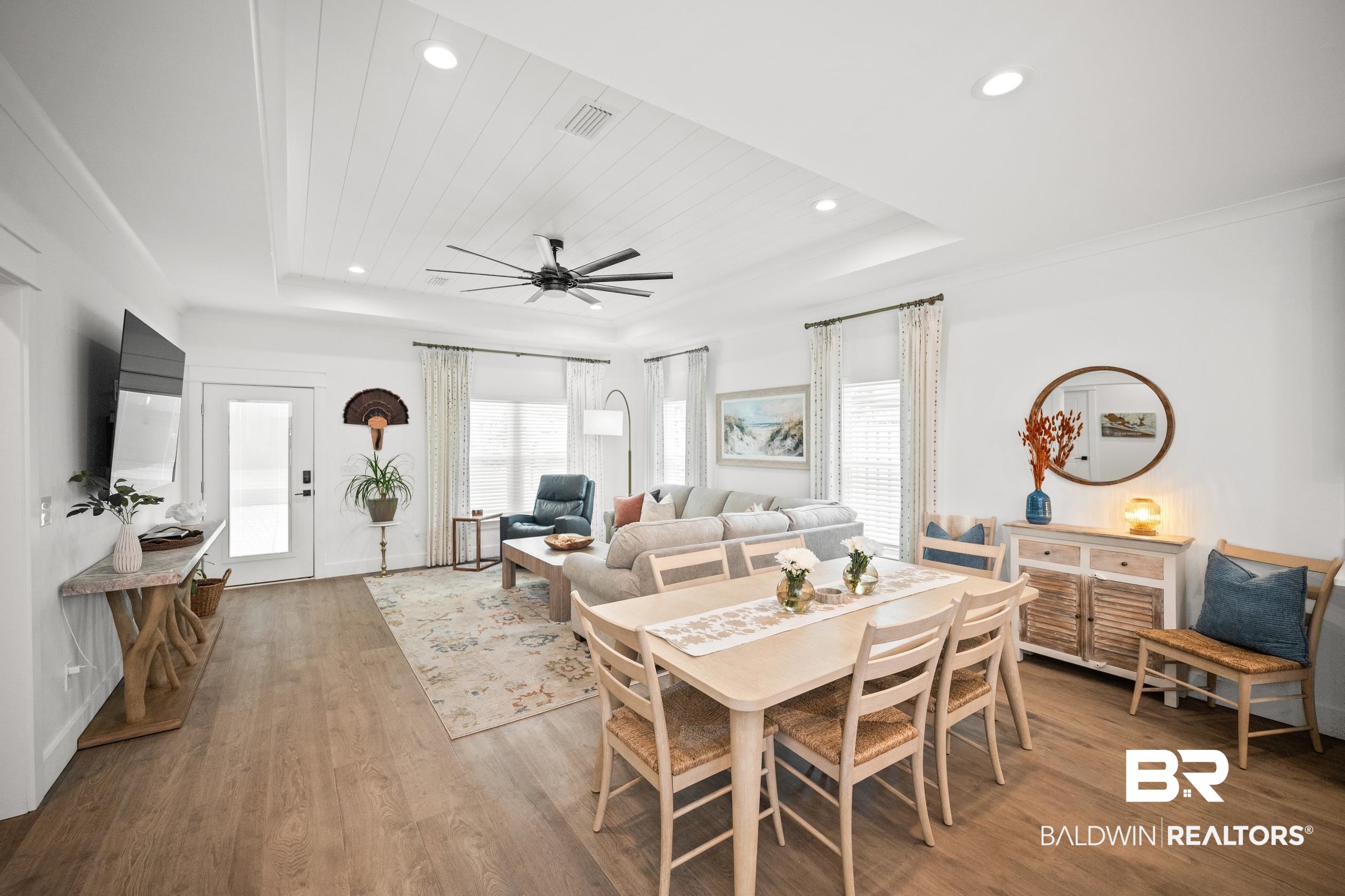 5501 Mobile Avenue Orange Beach, AL 36561 - Photo 4 of 40 Dining area with a raised ceiling, wood finished floors, recessed lighting, and ceiling fan