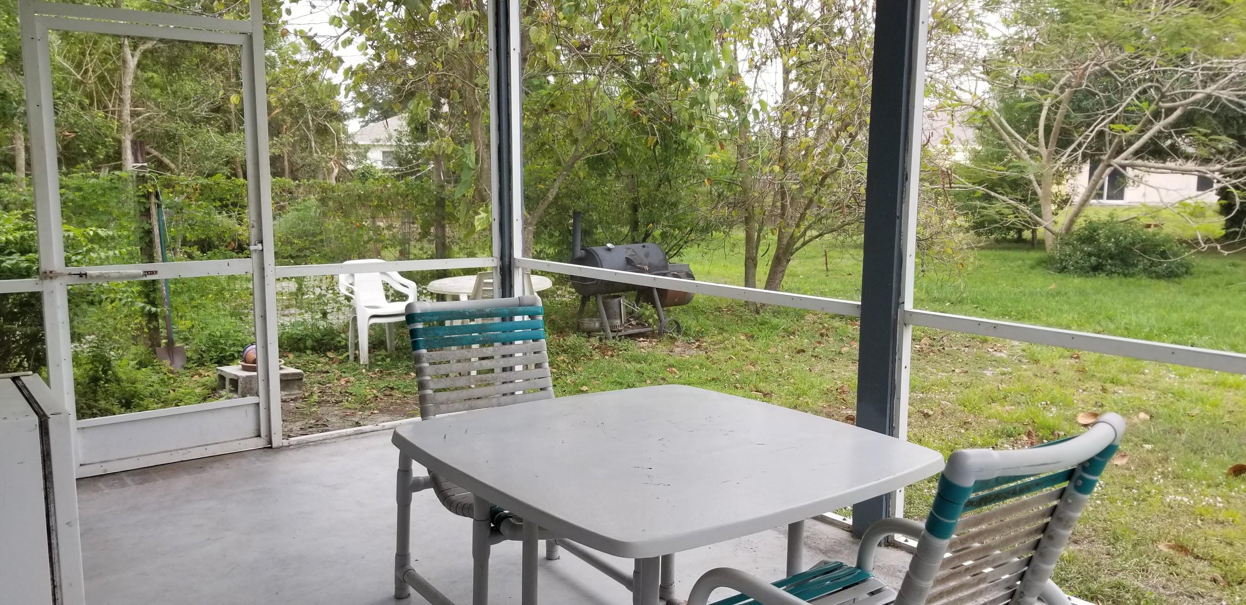 1562 Southwest Gager Road Port St. Lucie, FL 34953 - Photo 31 of 39 Gager side yard
