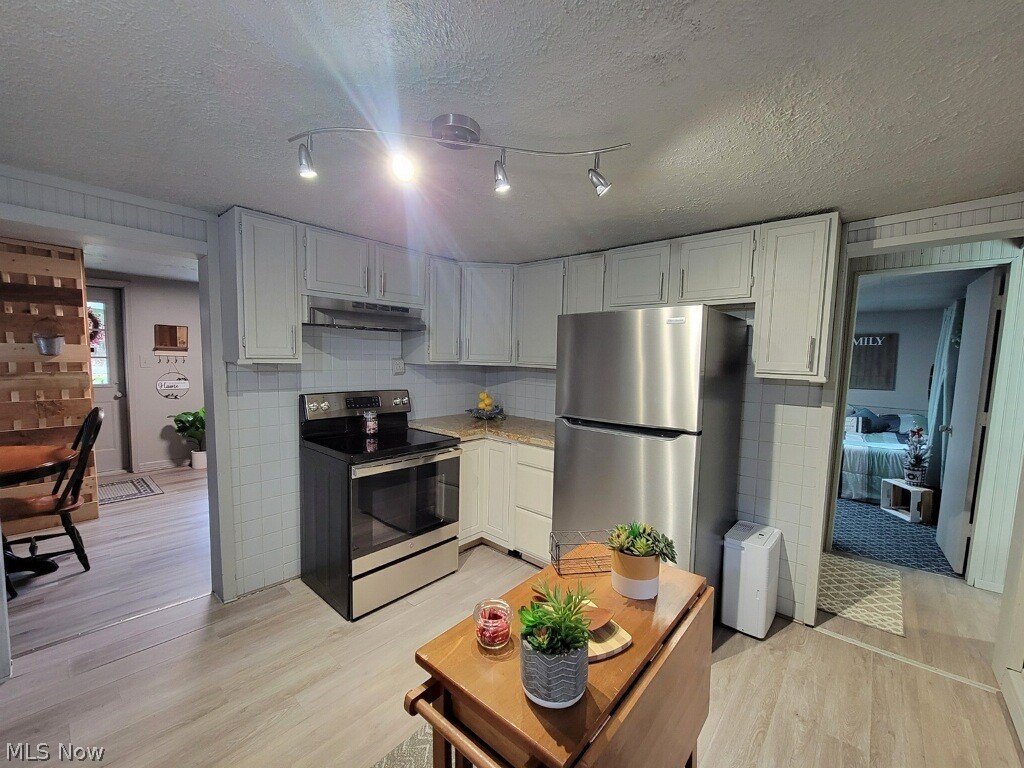 7364 Peck Road Ravenna, OH 44266 - Photo 14 of 35 New stainless-steel appliances will stay!
