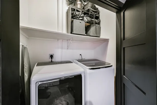 a room with gym equipment and view of living room