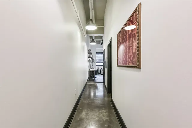 a room with furniture a flat screen tv and a fireplace