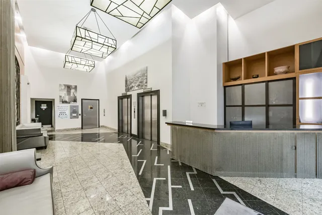 a view of a living room and a chandelier