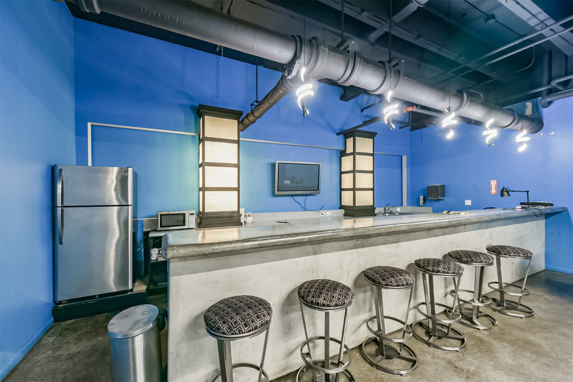 705 Main Street, Unit 321 Houston, TX 77002 - Photo 39 of 39 a kitchen with stainless steel appliances granite countertop a sink a stove and a refrigerator