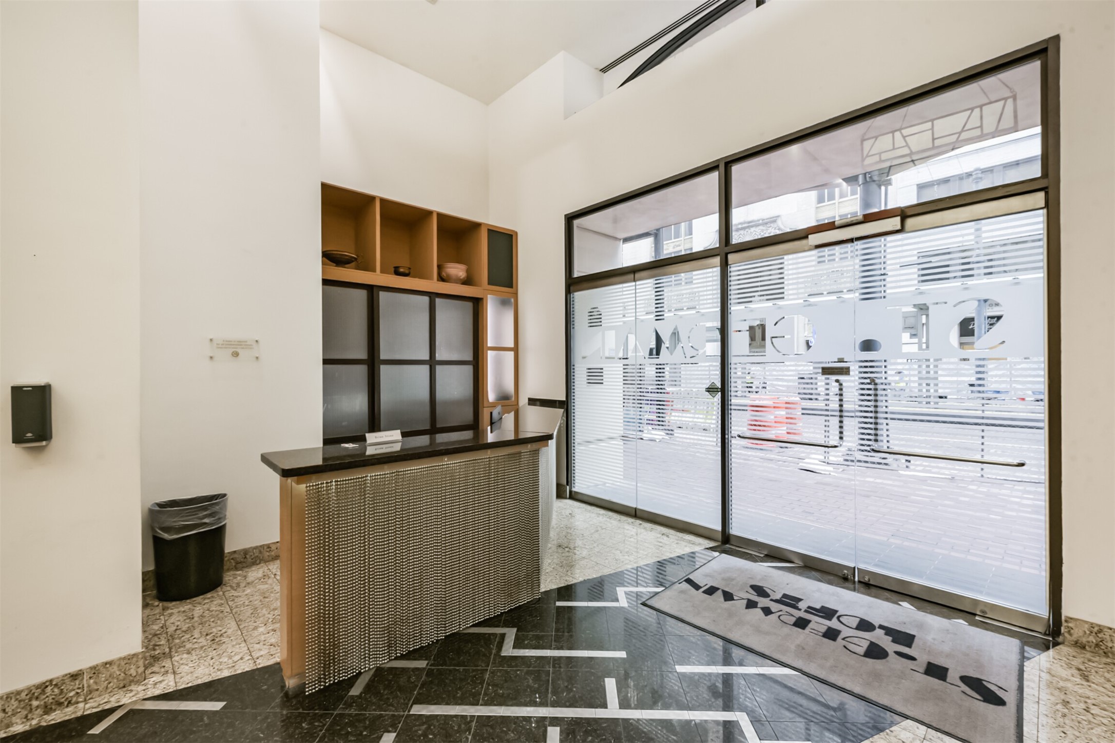 705 Main Street, Unit 321 Houston, TX 77002 - Photo 5 of 39 a kitchen with stainless steel appliances granite countertop a refrigerator and a stove
