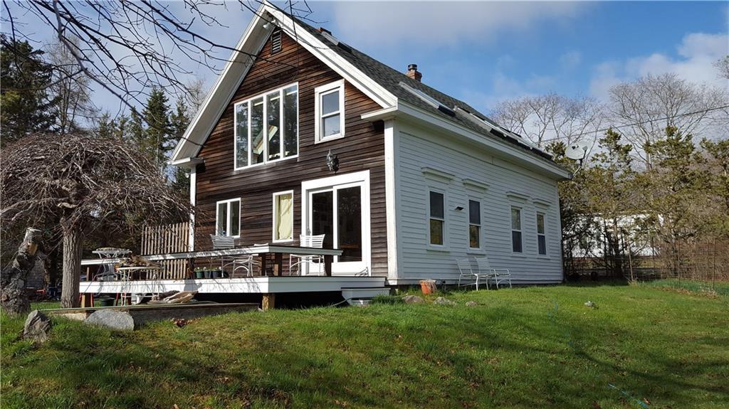 Exterior rear, red cedar siding