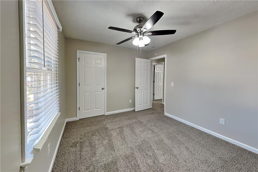 3094 Calumet Circle Northwest Kennesaw, GA 30152 - Photo 12 of 23 a view of an empty room with a window