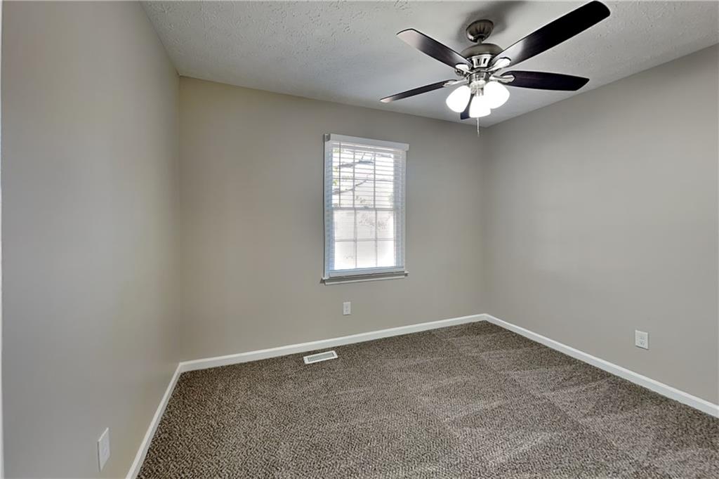 3094 Calumet Circle Northwest Kennesaw, GA 30152 - Photo 14 of 23 an empty room with a window