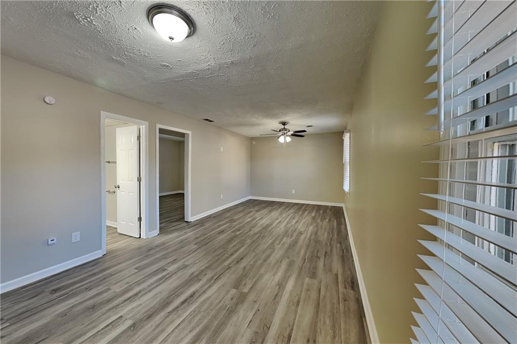 3094 Calumet Circle Northwest Kennesaw, GA 30152 - Photo 20 of 23 a view of a room with wooden floor