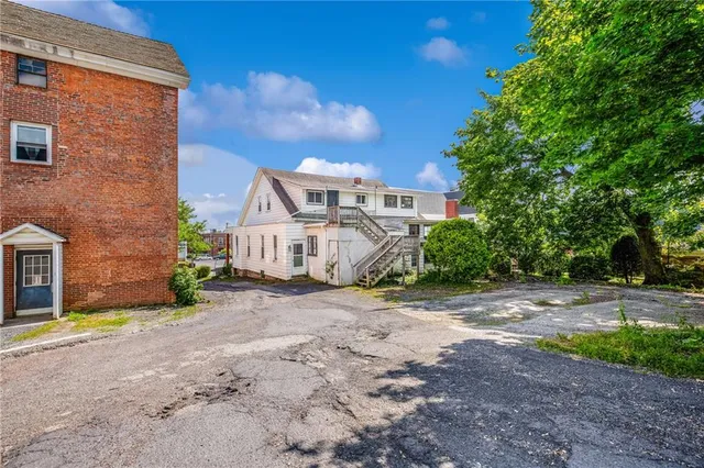a view of a house with a street
