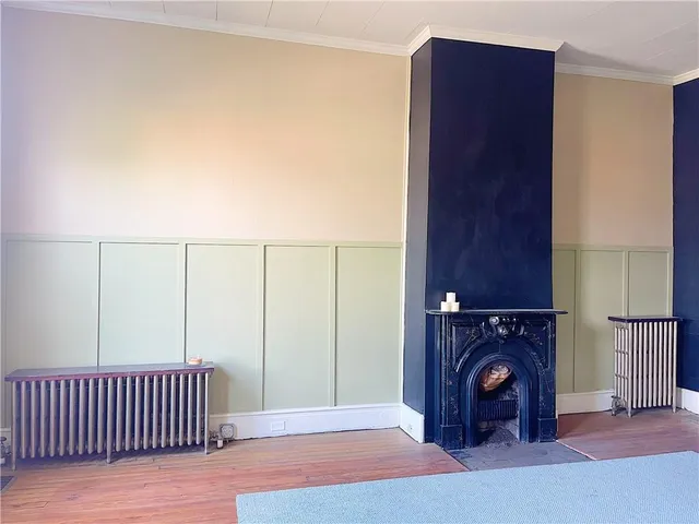 a view of a bedroom with washer and dryer