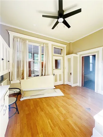 a view of a kitchen with a sink and cabinets