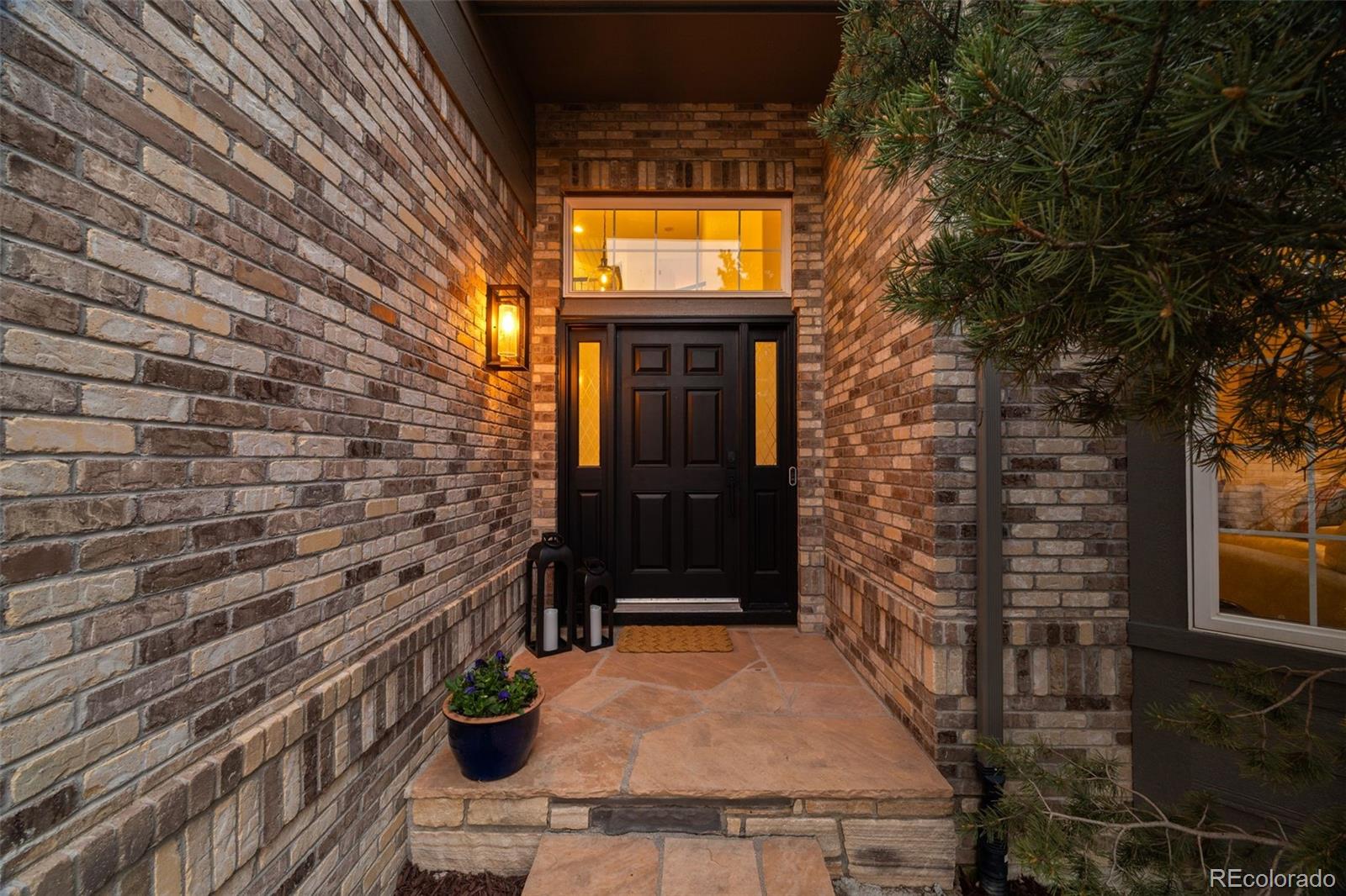551 Seth Place Castle Pines, CO 80108 - Photo 2 of 50 a view of entrance door of the house