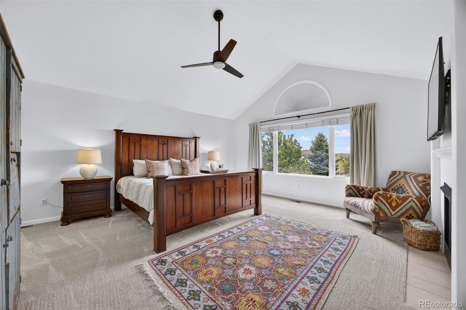 551 Seth Place Castle Pines, CO 80108 - Photo 23 of 50 a bedroom with furniture and a window