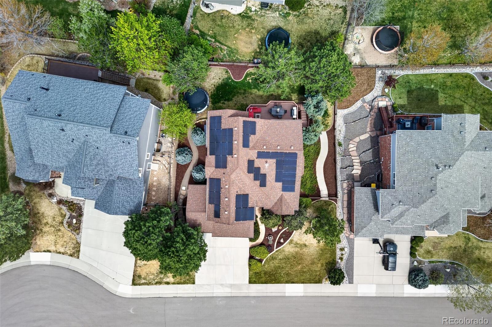 551 Seth Place Castle Pines, CO 80108 - Photo 44 of 50 an aerial view of residential houses with outdoor space