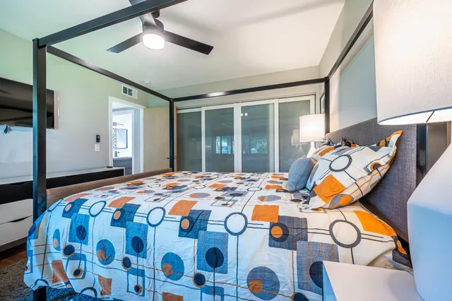 a kitchen with stainless steel appliances a stove a microwave and a refrigerator