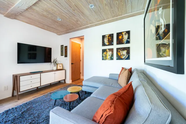 a bath tub sitting next to a window