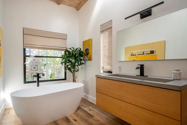 a view of an house with backyard space and swimming pool