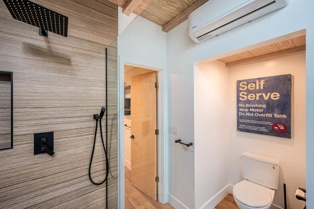 a view of house with swimming pool outdoor seating