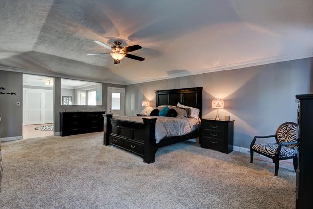 486 Cambridge Road Clarksville, TN 37043 - Photo 9 of 19 Gigantic master bedroom, with restful colors and door to patio.