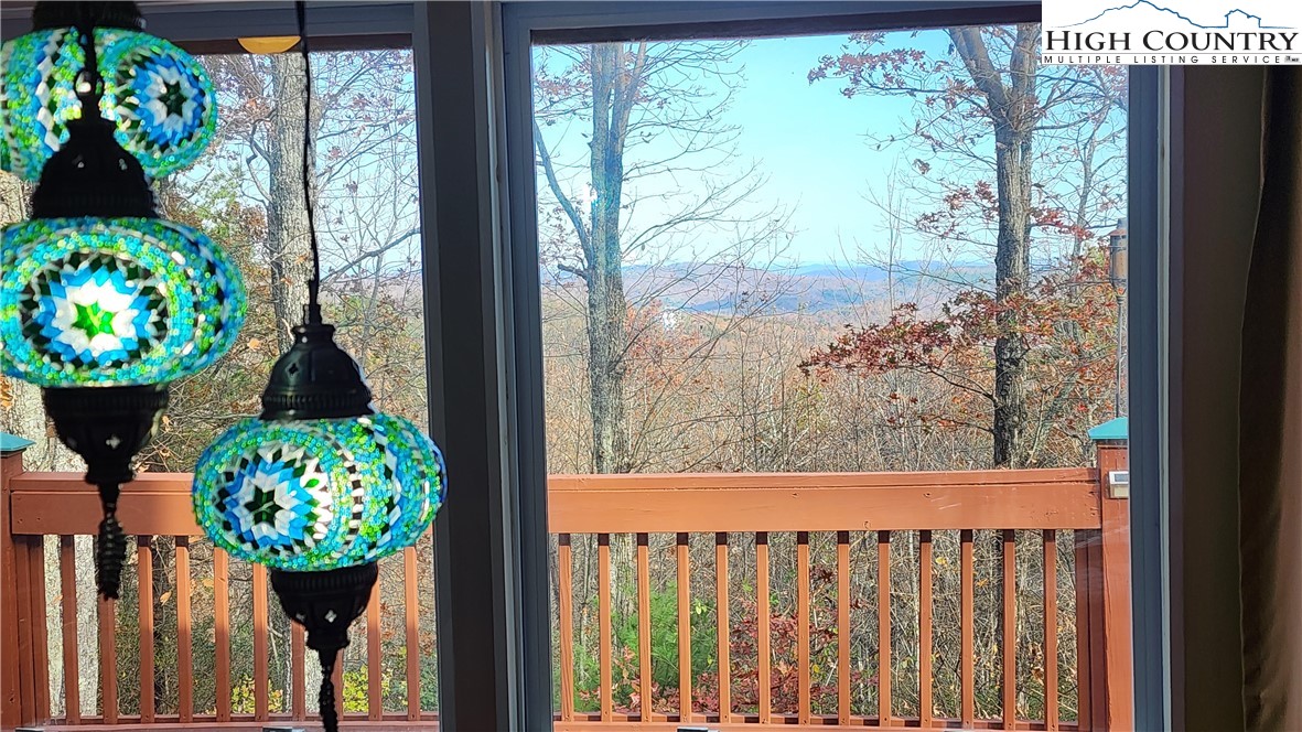 a view of a potted plant next to a window