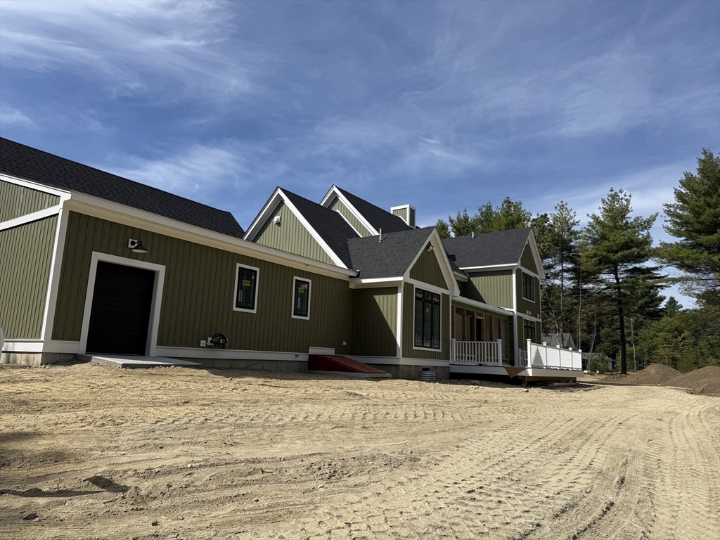4 Orange Street, Unit LOT 11 Douglas, MA 01516 - Photo 4 of 15 a front view of a house with a yard