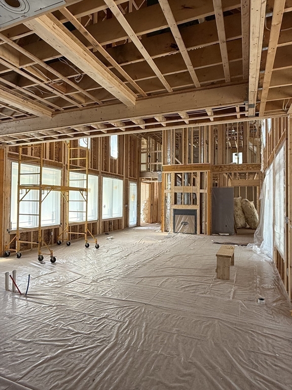 4 Orange Street, Unit LOT 11 Douglas, MA 01516 - Photo 7 of 15 a view of an empty room with wooden floor and a window
