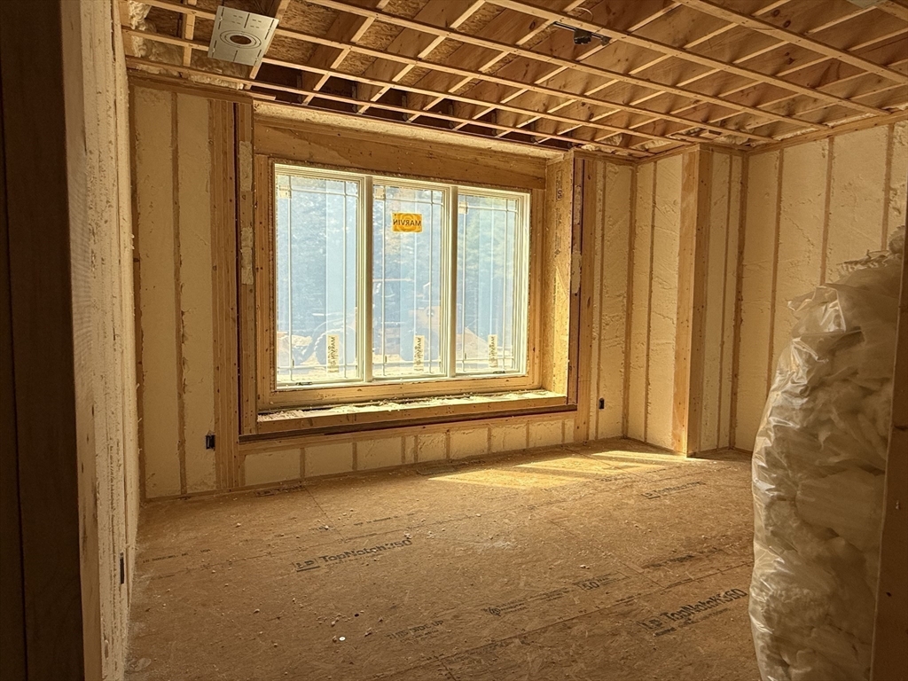 4 Orange Street, Unit LOT 11 Douglas, MA 01516 - Photo 8 of 15 a view of a room with large windows
