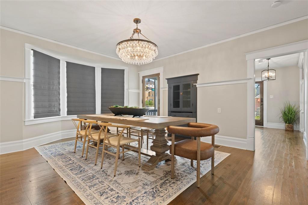 4 West Orange Street Tarpon Springs, FL 34689 - Photo 12 of 39 a view of a dining room with furniture window and wooden floor