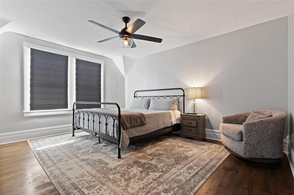 4 West Orange Street Tarpon Springs, FL 34689 - Photo 27 of 39 a bedroom with a bed and window