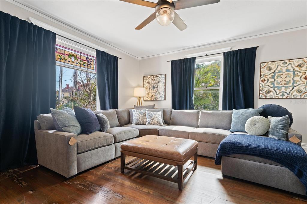 4 West Orange Street Tarpon Springs, FL 34689 - Photo 6 of 39 a living room with furniture and a large window