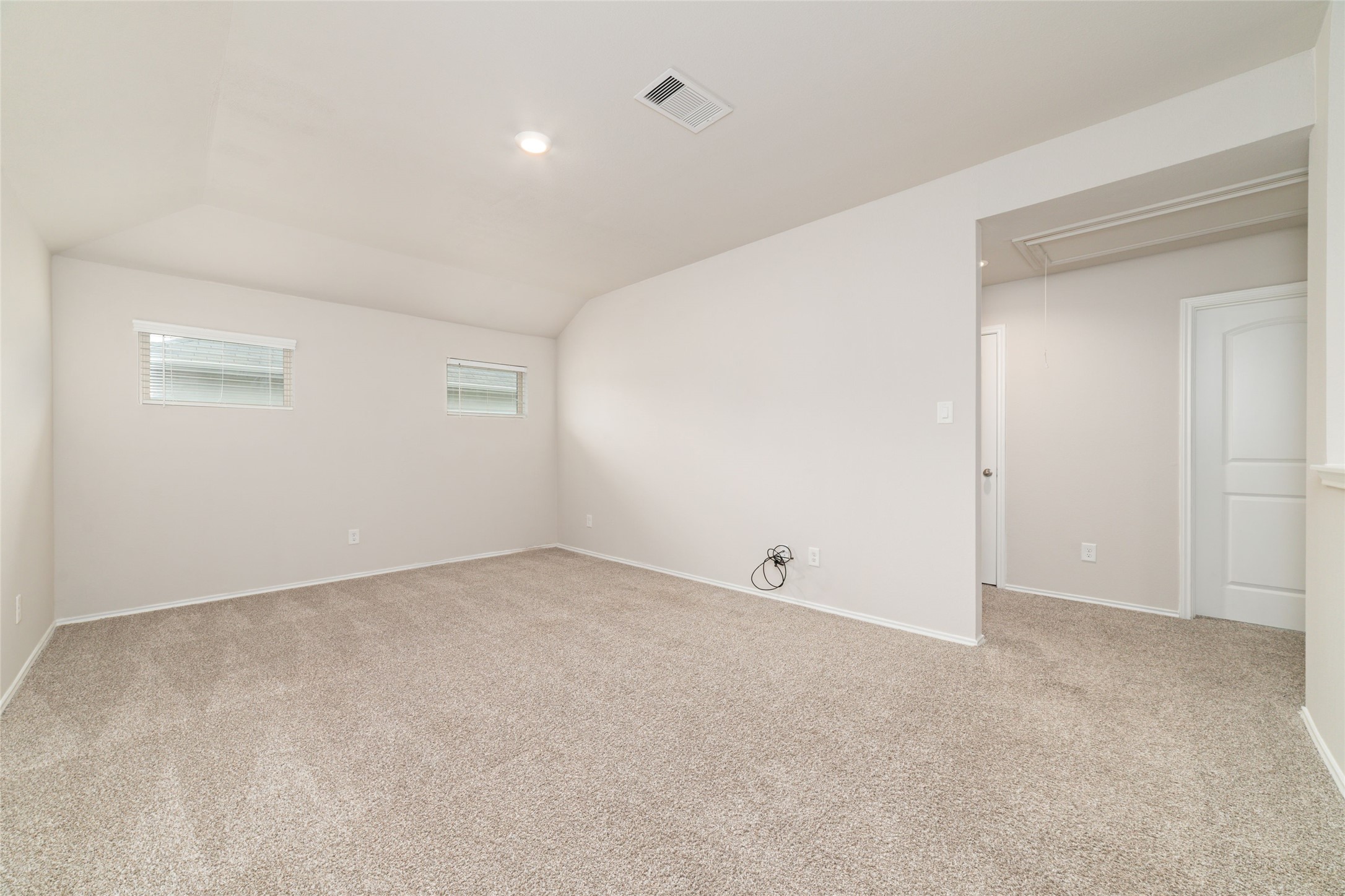 23702 Harrow Field Ln Spring Spring, TX 77373 - Photo 25 of 32 an empty room with an entryway