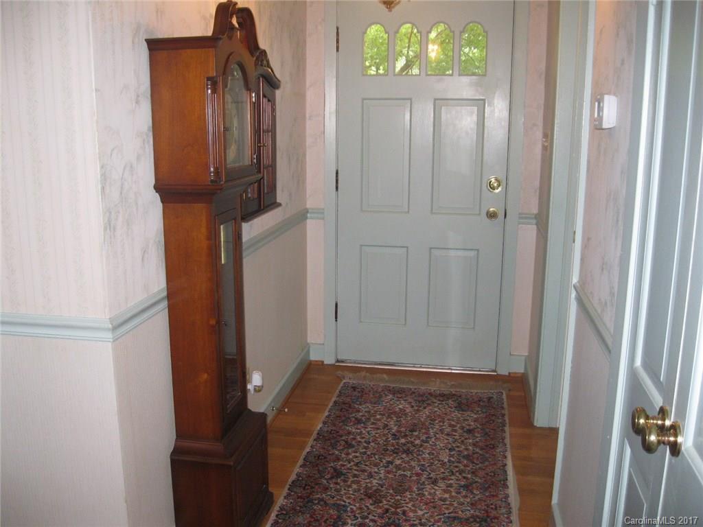 421 Fieldstone Road Mooresville, NC 28115 - Photo 2 of 18 a view of hallway with wooden floor