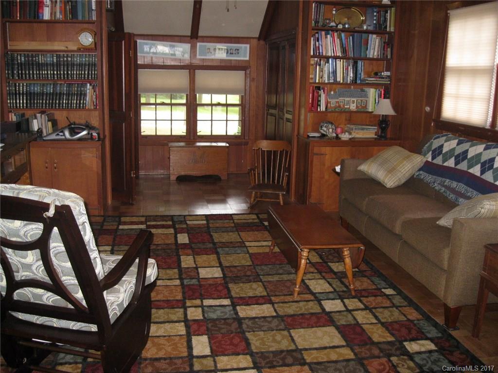 421 Fieldstone Road Mooresville, NC 28115 - Photo 5 of 18 a room with chairs and a rug