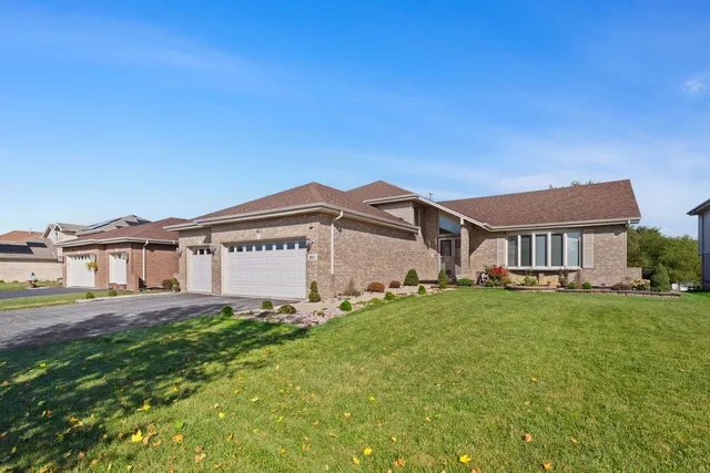 a house view with a garden space