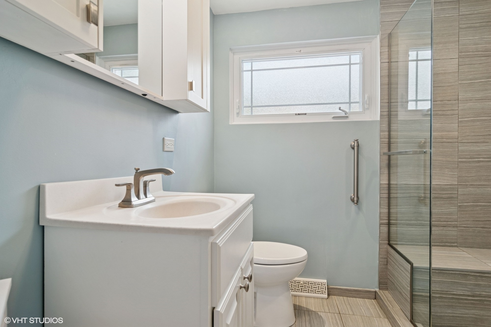 1505 Good Avenue Park Ridge, IL 60068 - Photo 11 of 19 a bathroom with a sink toilet and vanity