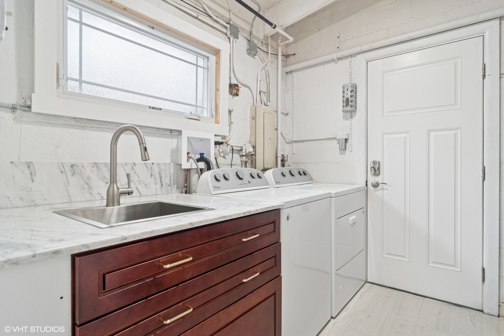 1505 Good Avenue Park Ridge, IL 60068 - Photo 13 of 19 a bathroom with a sink and a mirror