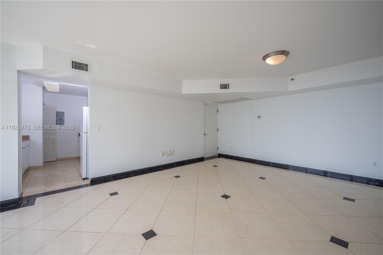 5900 Collins Avenue, Unit 906 Miami Beach, FL 33140 - Photo 17 of 49 a view of an empty room
