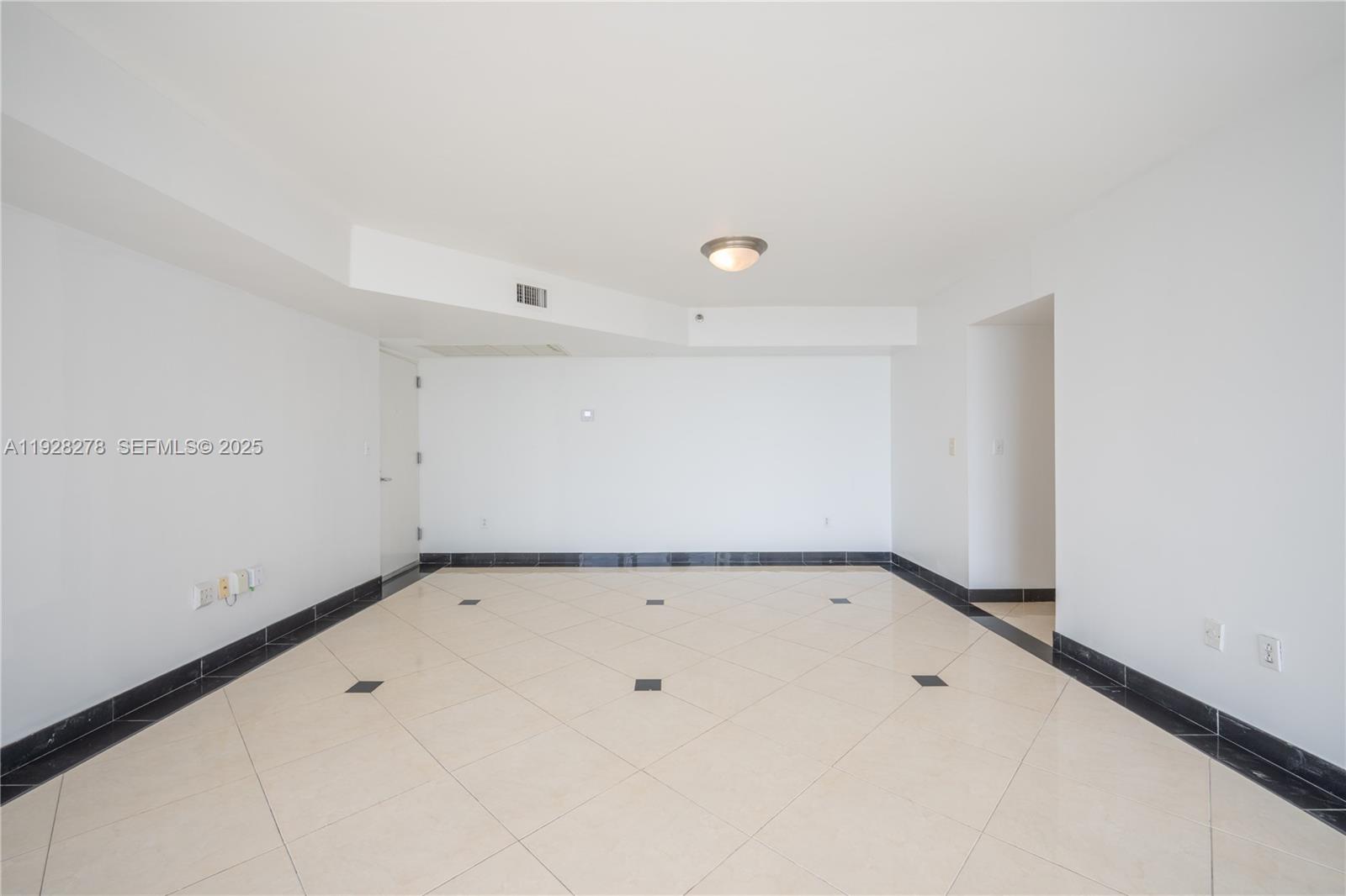 5900 Collins Avenue, Unit 906 Miami Beach, FL 33140 - Photo 19 of 49 a view of an empty room