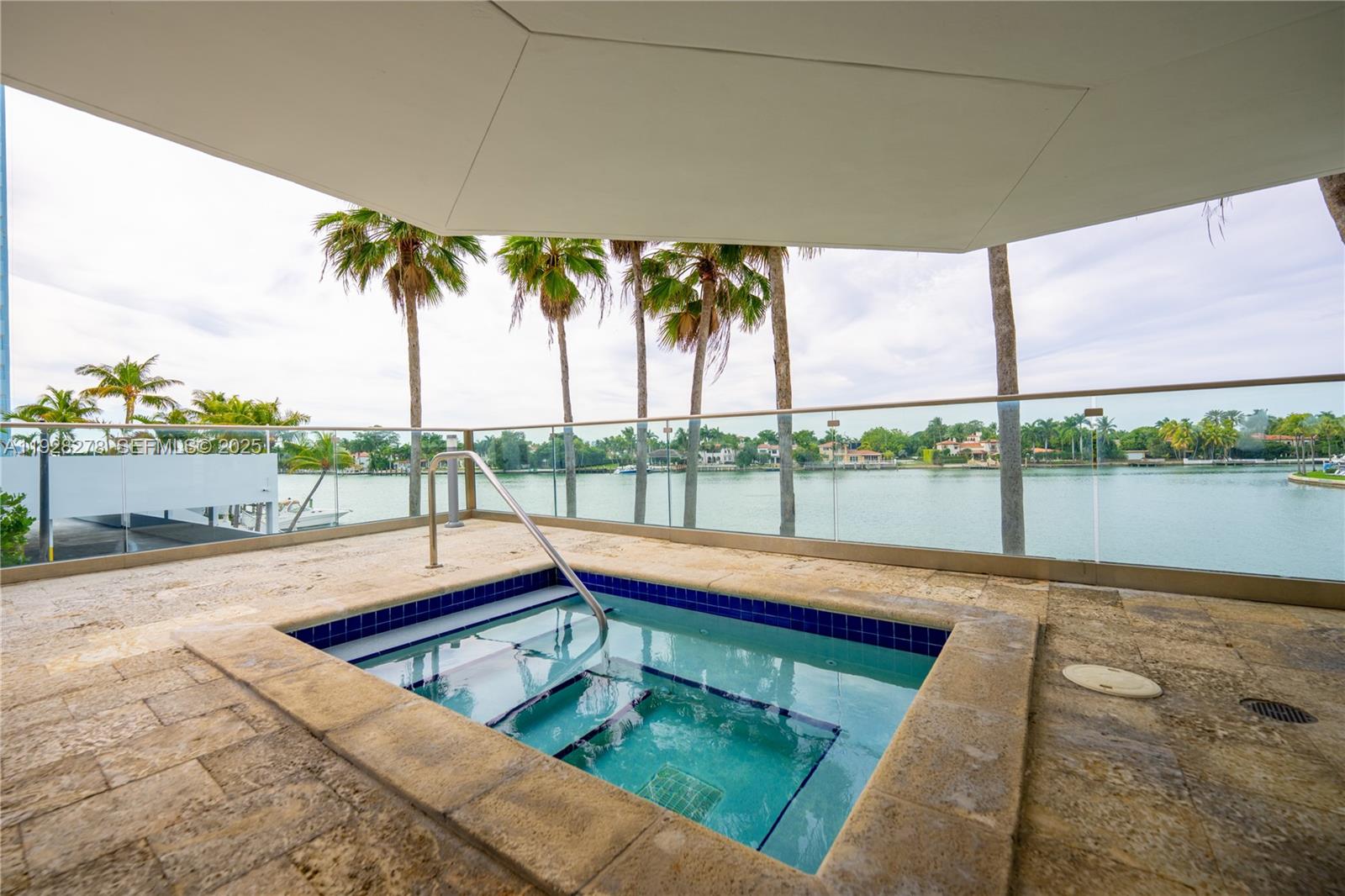 5900 Collins Avenue, Unit 906 Miami Beach, FL 33140 - Photo 34 of 49 a view of swimming pool with a patio