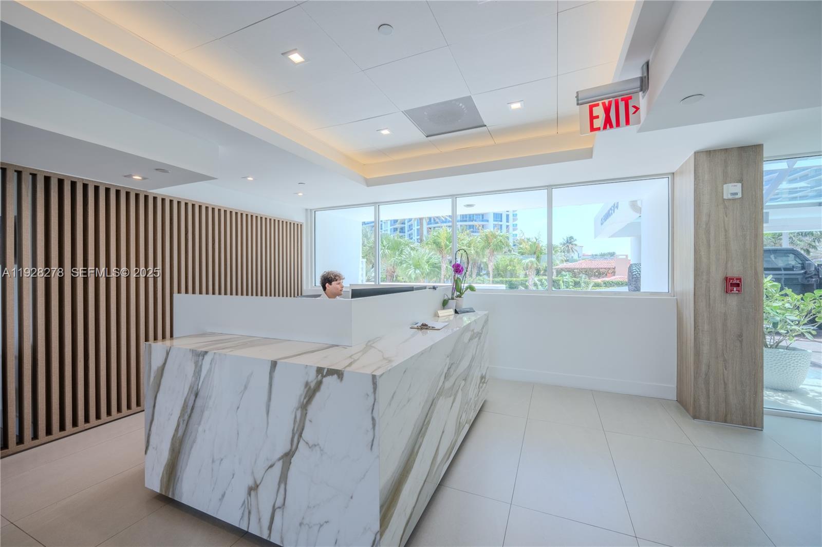 5900 Collins Avenue, Unit 906 Miami Beach, FL 33140 - Photo 41 of 49 a room with table and window