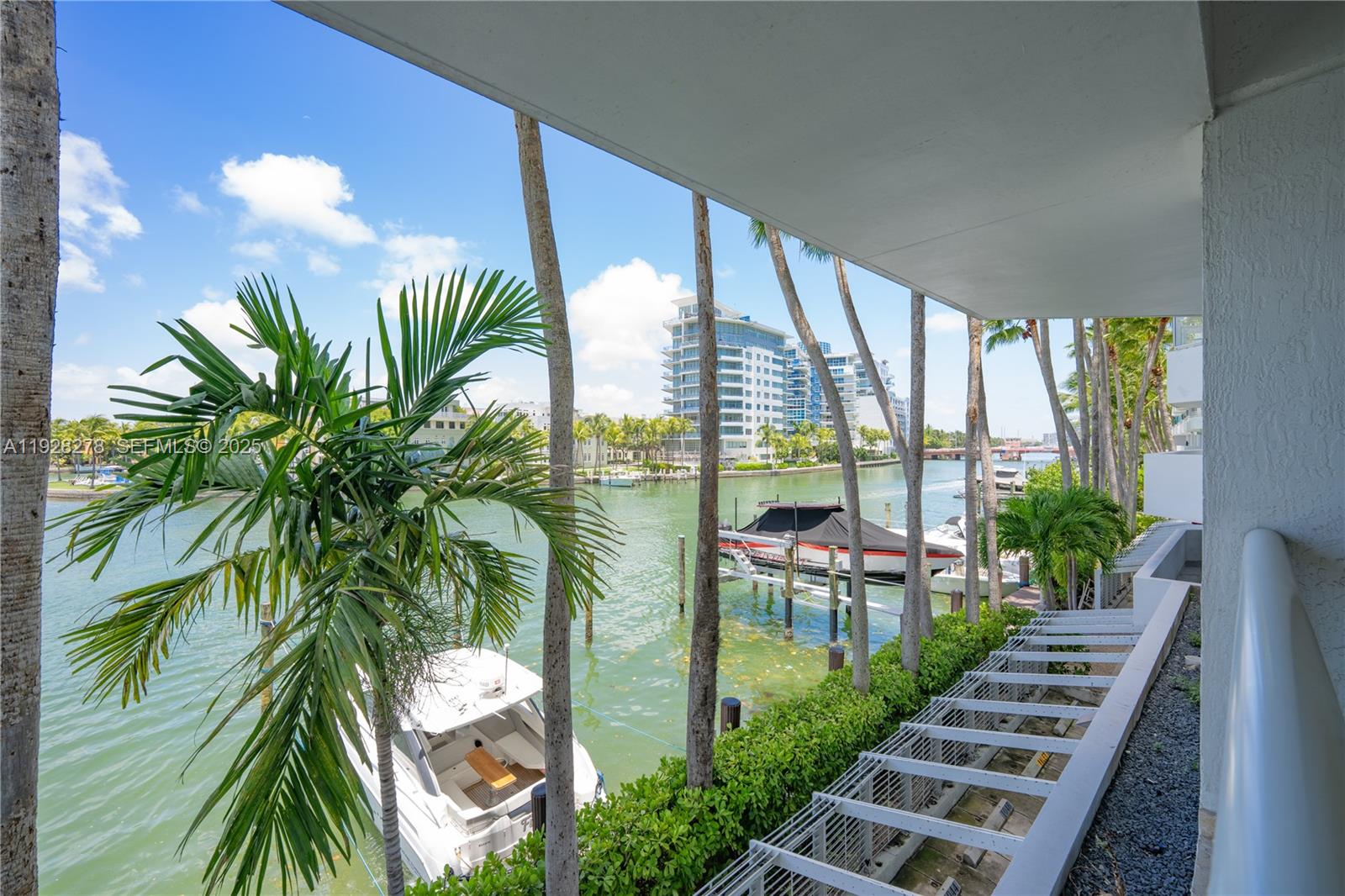 5900 Collins Avenue, Unit 906 Miami Beach, FL 33140 - Photo 48 of 49 a view of a porch and chairs