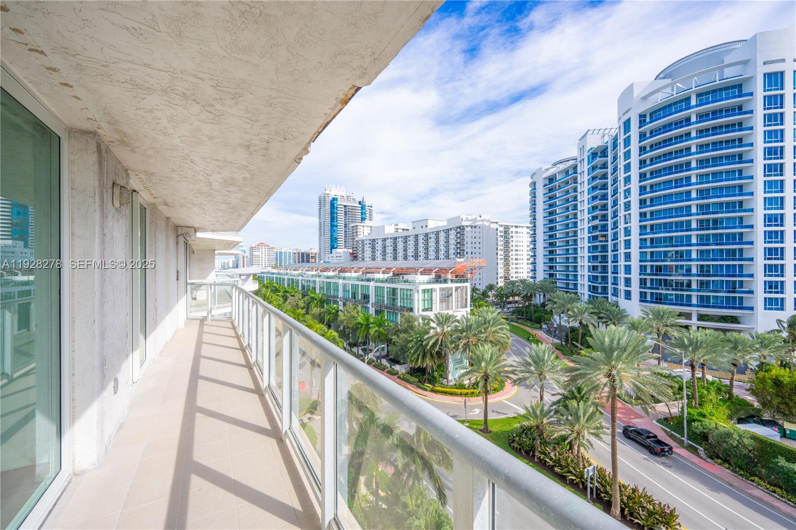 5900 Collins Avenue, Unit 906 Miami Beach, FL 33140 - Photo 7 of 49 a view of balcony with a potted plant