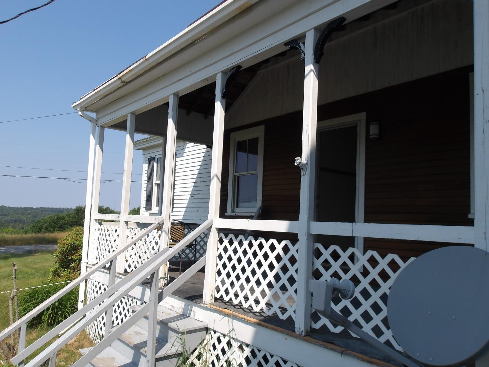 881 Pond Road Gouldsboro, ME 04607 - Photo 12 of 69 Side porch entry exterior