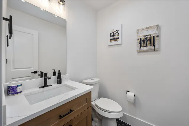 a bathroom with a sink and a toilet