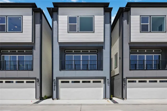 a house with a window and balcony