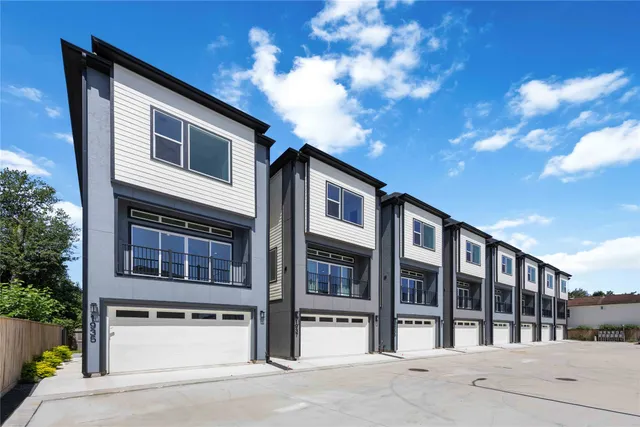 a front view of building with street