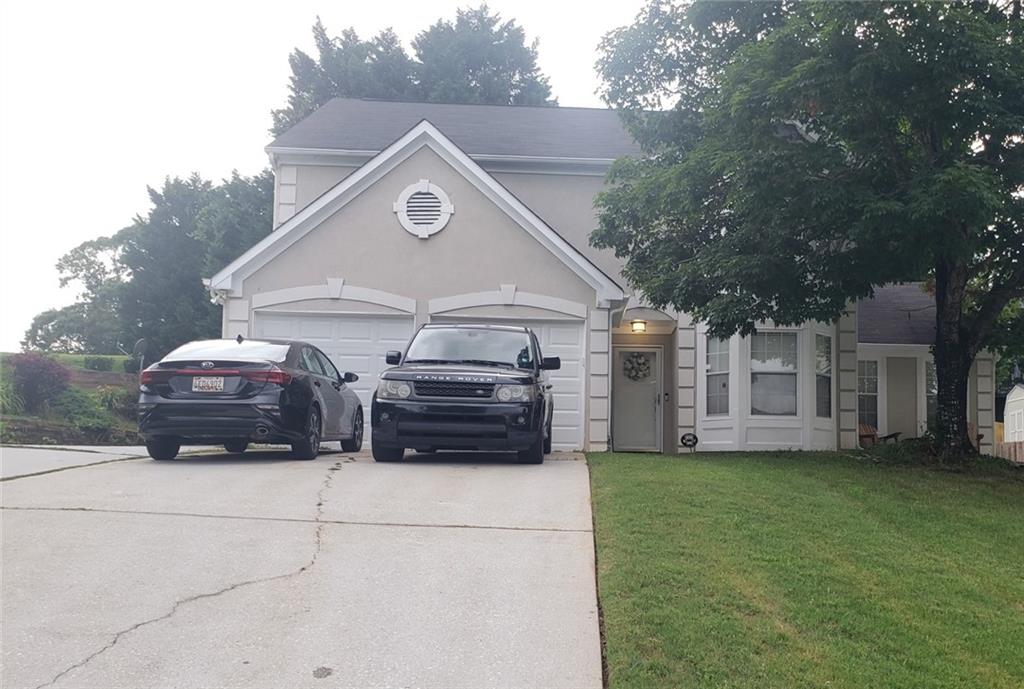 2819 Da Vinci Boulevard Decatur, GA 30034 - Photo 1 of 1 a view of a car in front of house