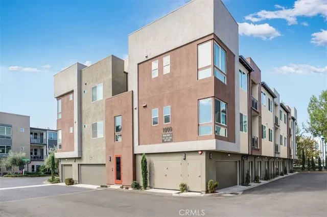 a front view of a building with a street